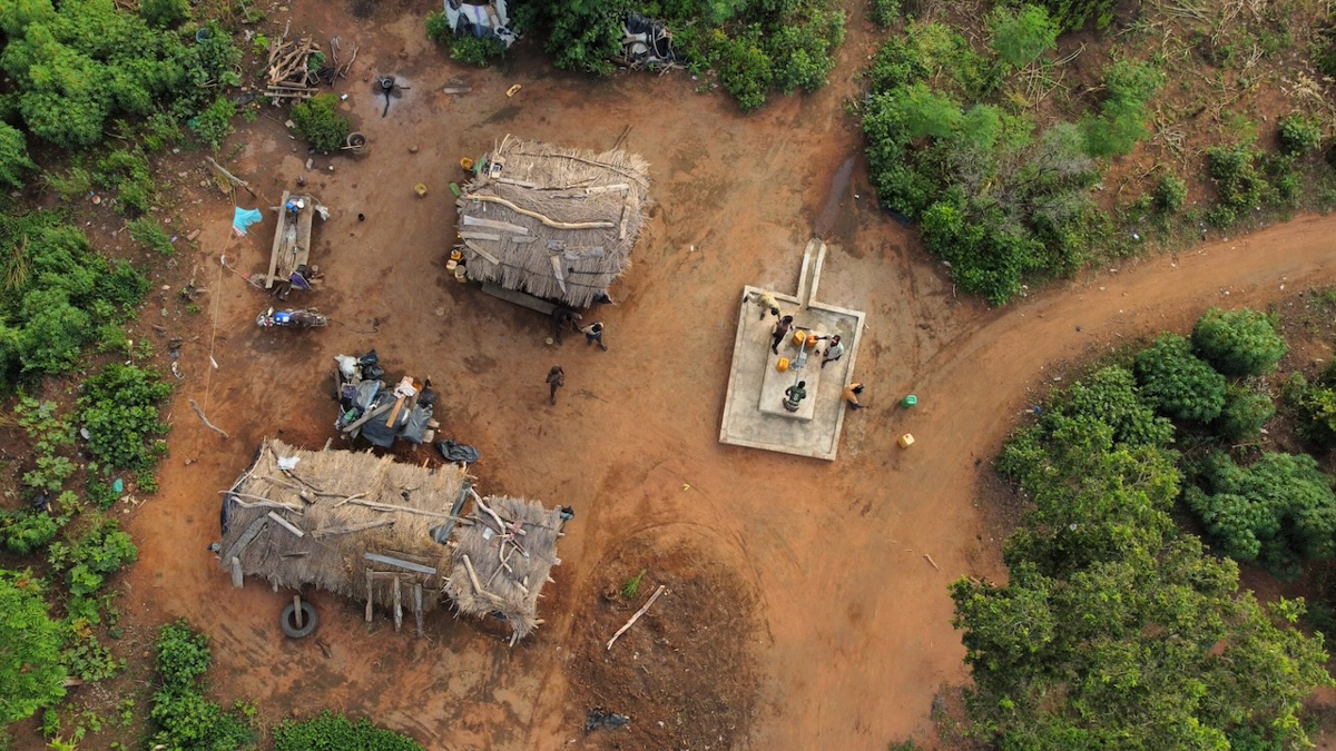Aerial drone view of a rural village and water well site in the Savannah Region of Ghana